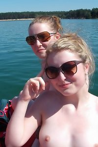 Big-breasted chicks sharing sultry lesbian kisses